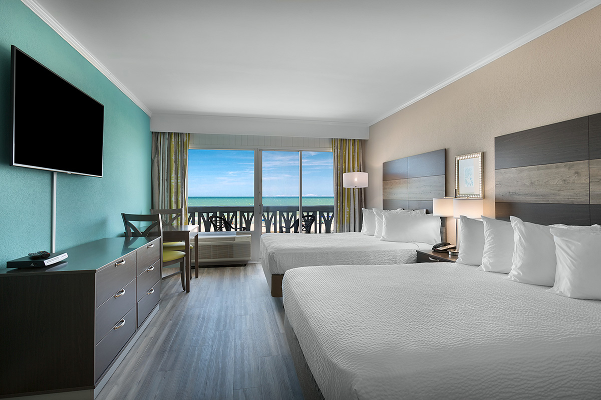 Caribbean Jamaican Oceanfront Room Bedroom 1200x800 1 